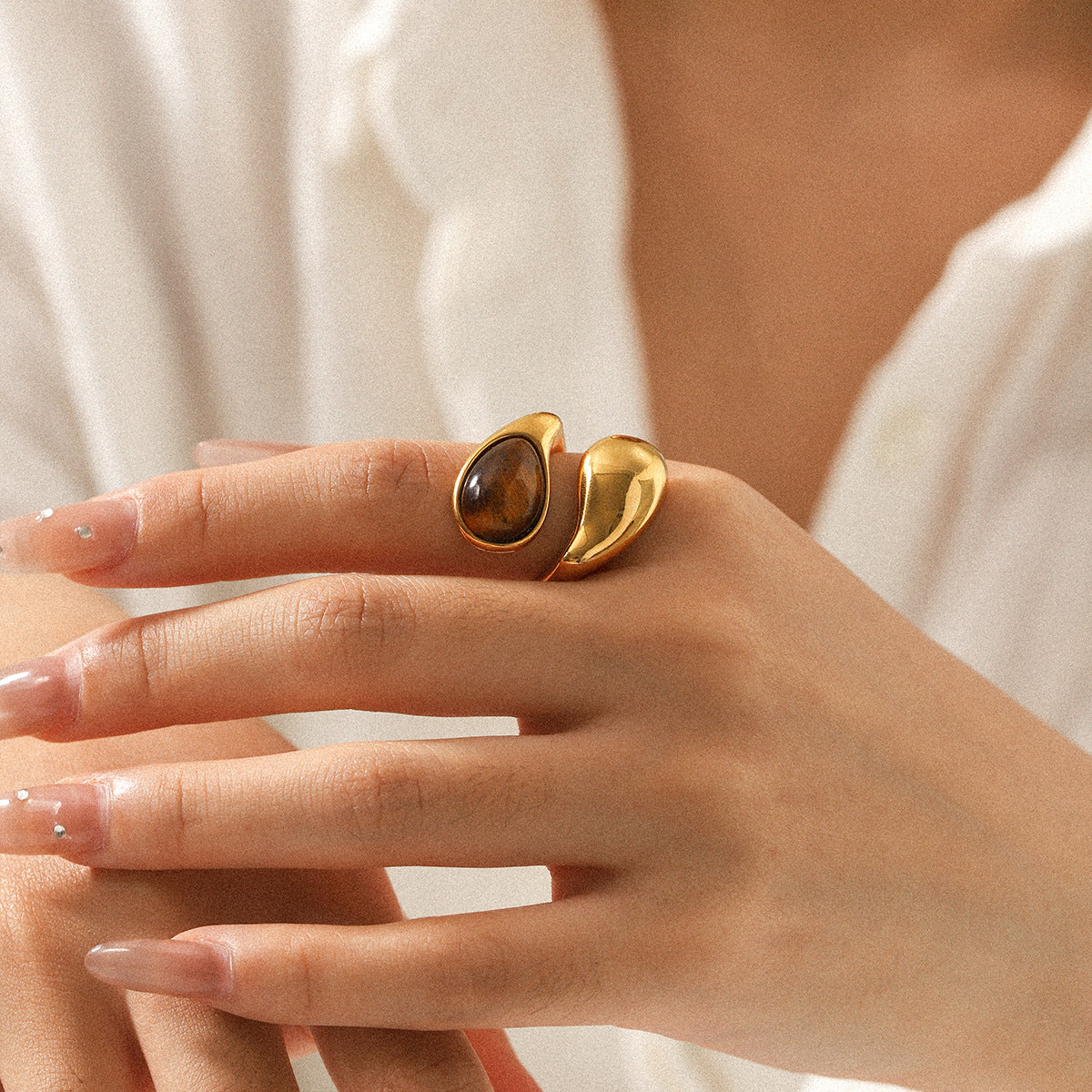 Waterdrop shaped stainless steel inlaid tiger eye stone ring