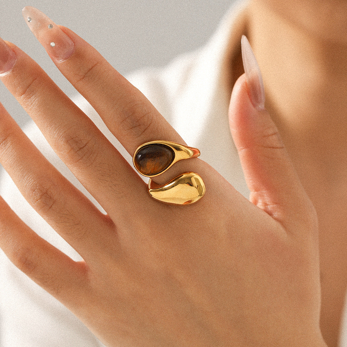Waterdrop shaped stainless steel inlaid tiger eye stone ring