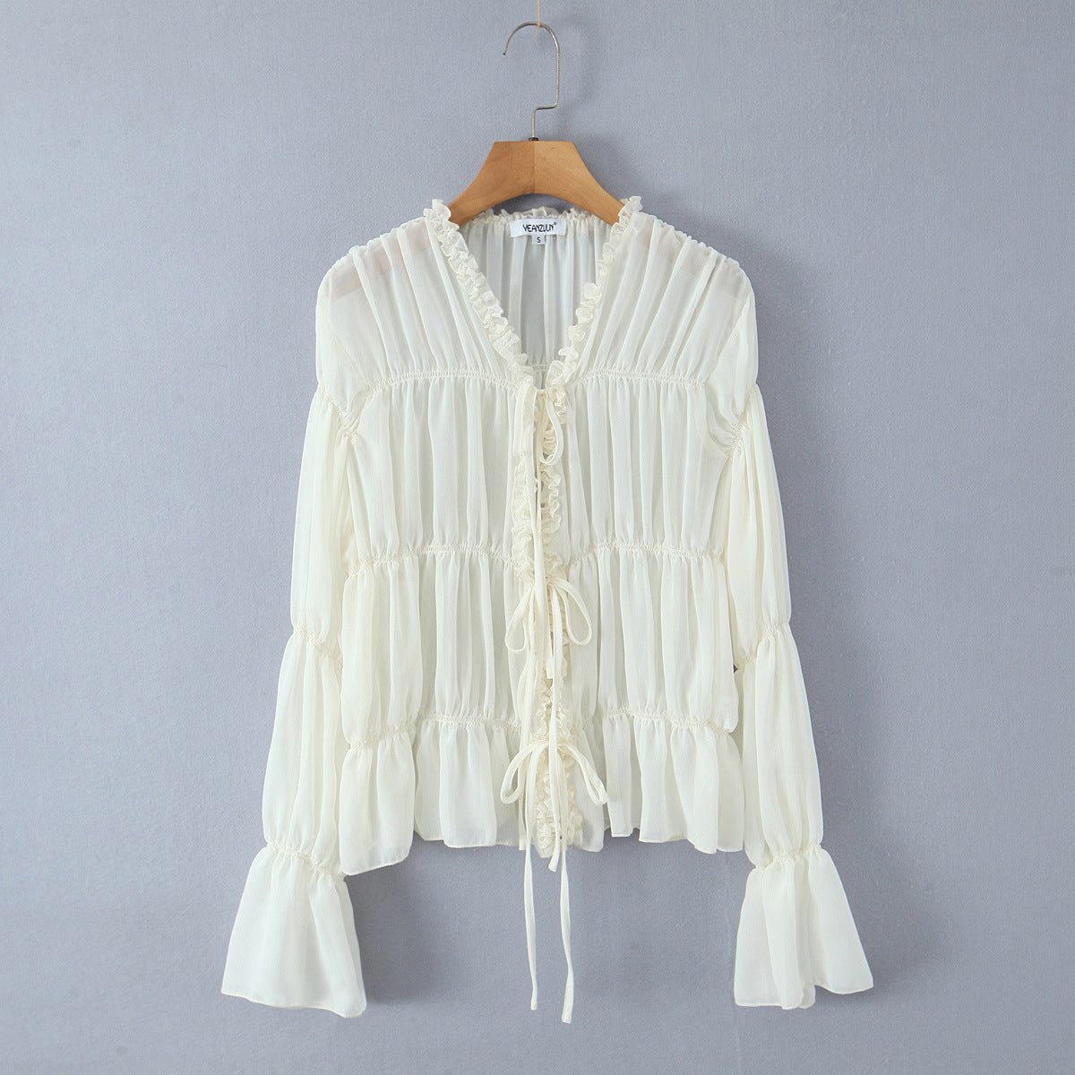 V-neck pleated strap long sleeved top