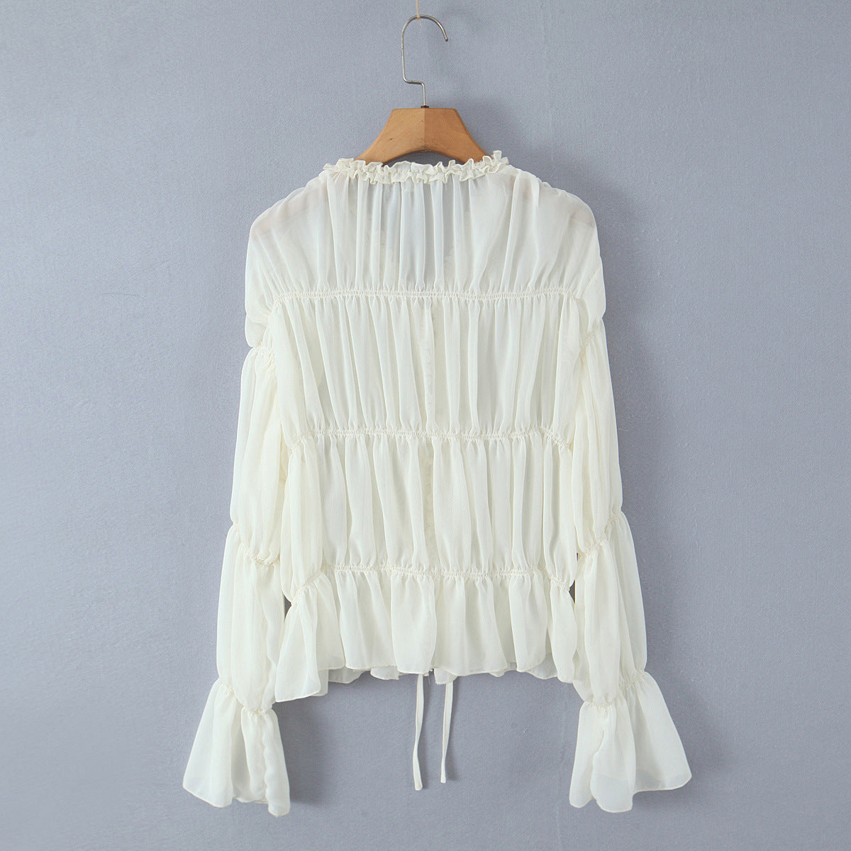 V-neck pleated strap long sleeved top